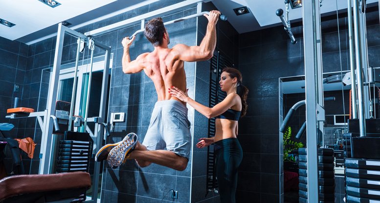 Young man training in the Gym